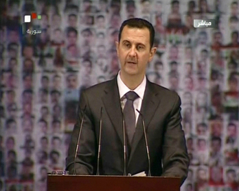 Al-Assad durante el discurso que ha ofrecido a través de la televisión. (AFP)